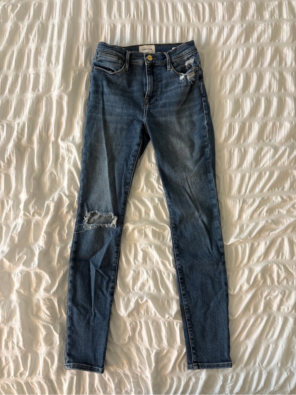 Frame Denim Skinny Jeans in Dark Blue with Distressed Knees